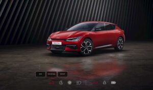 Дизайн передка Kia EV6 2022 - агрессивный вид с угловатыми воздухозаборниками и отсутствием решетки радиатора.